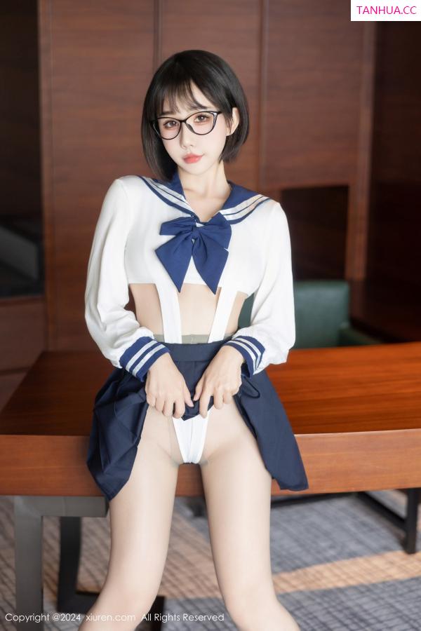 小蛮妖  [XiuRen]高清写真图 2024.08.26 No.9065 小蛮妖Yummy 黑丝美腿第8张图片